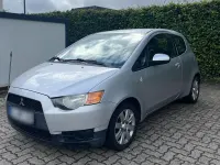 Gebraucht Mitsubishi Colt 95 PS (69 kW) 2010 Silber Kleinwagen
