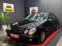 Second-hand Mercedes E200 163 CP (119 kW) 2003 Negru Berlinǎ