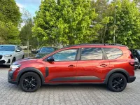 Gebraucht Dacia Jogger Extreme 94 PS (69 kW) 2024 Terracottabraun (metallic) Van / Kleinbus