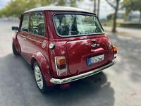 Second-hand Rover Mini 63 CP (46 kW) 2000 Roșu Coupe