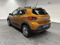 Gebraucht Dacia Sandero Expression 91 PS (66 kW) 2023 Orange (taklamakanorange met.) Kleinwagen