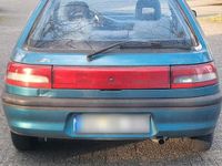 Gebraucht Mazda 323 75 PS (55 kW) 1994 Grün Kleinwagen
