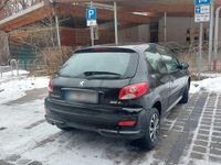 Gebraucht Peugeot 206 60 PS (44 kW) 2010 Schwarz Kleinwagen