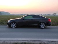 Używany Mercedes C220 170 KM (125 kW) 2012 Czarny Coupe