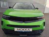 Gebraucht Opel Mokka GS Line 131 PS (96 kW) 2023 Lackierung matcha green/typ au SUV