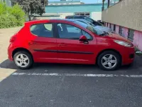 Gebraucht Peugeot 207 73 PS (53 kW) 2010 Rot Kleinwagen
