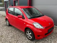 Gebraucht Daihatsu Sirion 69 PS (50 kW) 2009 Rot Kleinwagen