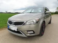 Używany Kia Ceed 116 KM (85 kW) 2013 Beżowy Hatchback