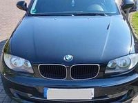 Second-hand BMW 116 122 CP (89 kW) 2011 Negru Hatchback