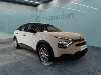 Używany Citroën e-C4 Feel 100 kW (136 KM) 2023 Biały Sedan/Limuzyna