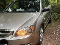 Używany Kia Cerato 98 KM (72 kW) 2005 Złoty Sedan/Limuzyna