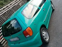 Gebraucht VW Polo 60 PS (44 kW) 1998 Grün Kleinwagen