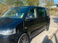 Używany VW T5 102 KM (75 kW) 2011 Czarny Van