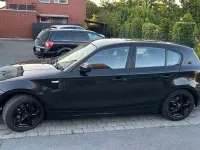 Gebraucht BMW 116 Basis 122 PS (89 kW) 2010 Schwarz Kleinwagen