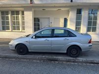 Gebraucht Ford Focus Ghia 101 PS (74 kW) 2002 Silber Limousine