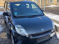 Gebraucht Daihatsu Sirion 69 PS (50 kW) 2010 Schwarz Kleinwagen