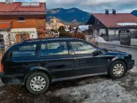 Używany Skoda Octavia 110 KM (80 kW) 2004 Czarny Kombi