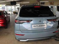 Neu Mitsubishi Outlander P-HEV Top 306 PS (225 kW) 2025 Mondsteingrau / pantherschwa SUV