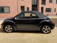 Gebraucht VW New Beetle 102 PS (75 kW) 2010 Schwarz Kleinwagen