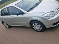 Używany Toyota Corolla 110 KM (80 kW) 2005 Srebrny Hatchback