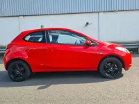 Gebraucht Mazda 2 Inclusive 86 PS (63 kW) 2009 Rot Kleinwagen