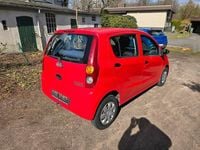 Gebraucht Daihatsu Cuore 69 PS (50 kW) 2011 Rot Kleinwagen