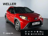 Gebraucht Toyota Aygo 72 PS (52 kW) 2025 Chili red / night sky black (rot) Kleinwagen