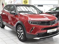Gebraucht Opel Mokka Elegance 131 PS (96 kW) 2021 Rot power rot met. SUV