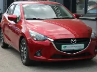 Używany Mazda 2 Nakama 90 KM (66 kW) 2016 Czerwony Sedan/Limuzyna