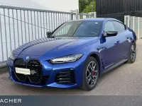 Gebraucht BMW i4 Performance 350 kW (476 PS) 2023 M portimao blau metallic Limousine