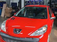 Gebraucht Peugeot 206+ 73 PS (53 kW) 2012 Rot Kleinwagen