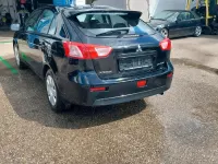 Second-hand Mitsubishi Lancer 109 CP (80 kW) 2010 Negru Berlinǎ