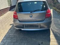 Używany BMW 116 122 KM (89 kW) 2008 Szary Hatchback