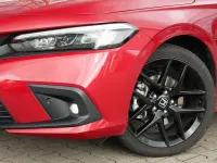 Gebraucht Honda Civic Hybrid 184 PS (135 kW) 2023 Premium crystal red Limousine