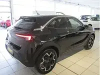 Gebraucht Opel Mokka-e Ultimate 100 kW (136 PS) 2024 Schwarz (lackierung schwarz perla nera/typ aussenverkl) SUV