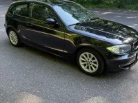 Gebraucht BMW 116 122 PS (89 kW) 2008 Schwarz Kleinwagen