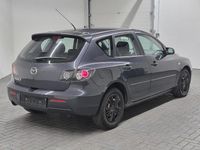 Usado Mazda 3 Active 105 HP (77 kW) 2007 Cinzento Sedan