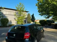 Gebraucht BMW 116 122 PS (89 kW) 2010 Schwarz Kleinwagen