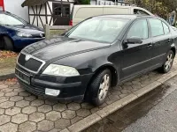 Używany Skoda Octavia Elegance 105 KM (77 kW) 2004 Czarny Sedan/Limuzyna