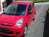 Gebraucht Daihatsu Cuore 69 PS (50 kW) 2007 Rot Kleinwagen