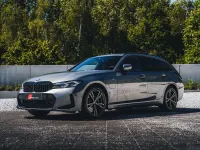 Gebraucht BMW 330e Performance 292 PS (214 kW) 2024 Grau Kombi