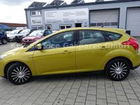 Gebraucht Ford Focus Trend 105 PS (77 kW) 2011 Gelb Limousine