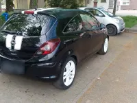 Używany Opel Corsa Edition 87 KM (63 kW) 2011 Czarny Hatchback