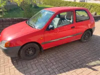 Gebraucht Toyota Starlet 69 PS (50 kW) 1996 Rot Kleinwagen