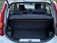 Gebraucht Daihatsu Cuore 69 PS (50 kW) 2010 Weiß Kleinwagen