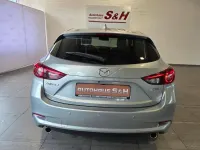 Używany Mazda 3 120 KM (88 kW) 2018 Srebrny Sedan/Limuzyna