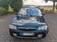 Gebraucht Mazda 323 88 PS (64 kW) 1998 Grün Limousine