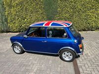 Second-hand Mini 1300 61 CP (44 kW) 1991 Albastru Hatchback