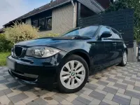 Gebraucht BMW 116 122 PS (89 kW) 2010 Schwarz Kleinwagen