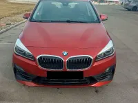 Używany BMW 225 231 KM (169 kW) 2018 Pomarańczowy Minivan